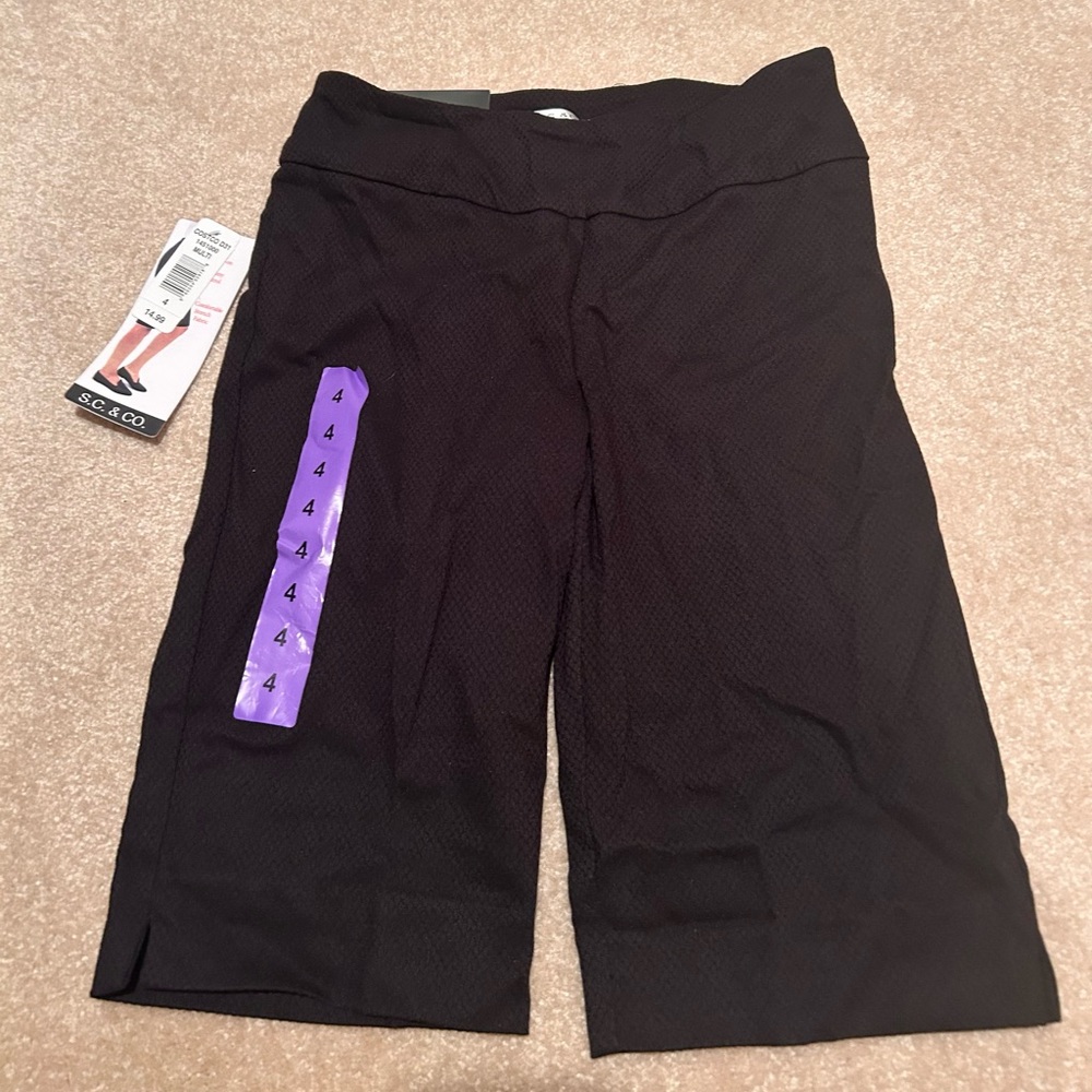 Black Bermuda shorts
